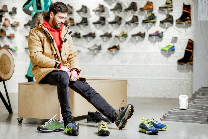 man-trying-on-shoes